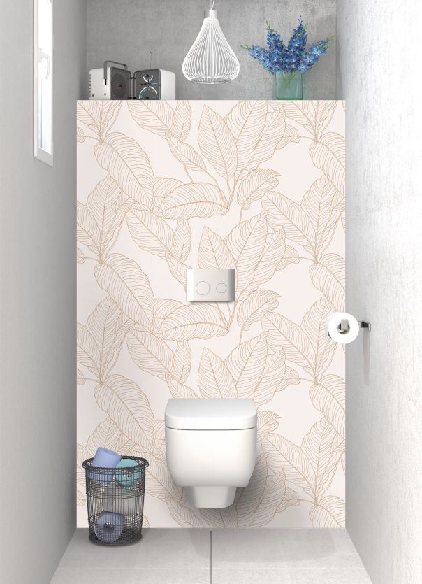 Revêtement mural toilettes déco avec motif de feuilles végétales sur fond de couleur rose pastel